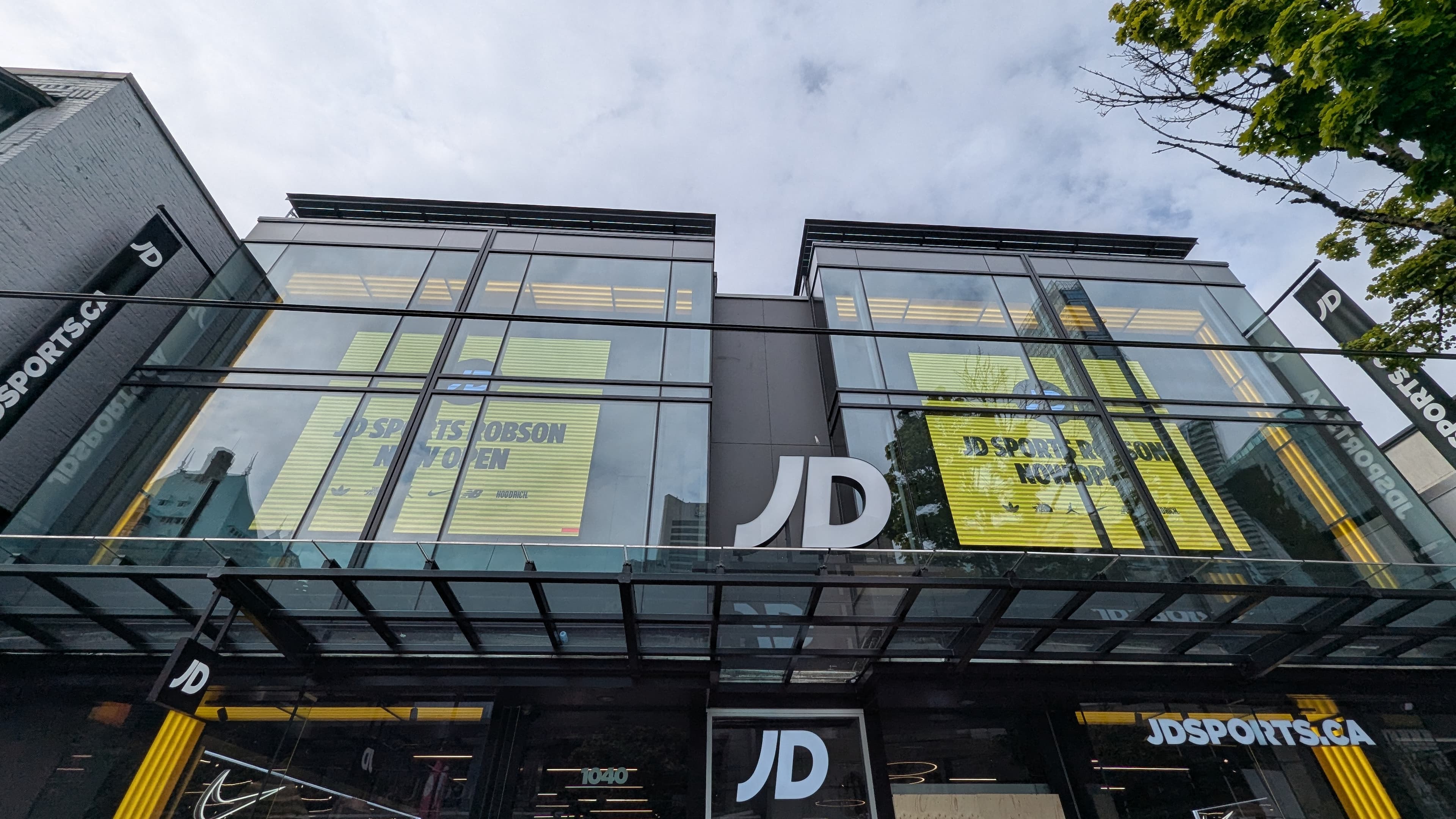 JD Sports store interior with large LED displays